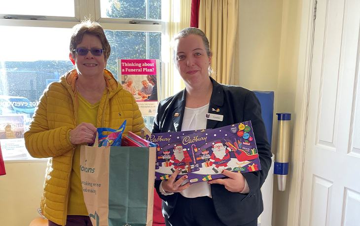 Woking team holding donations for Lighthouse Woking